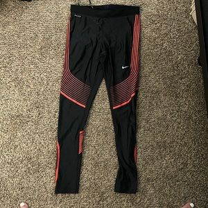 Nike dri fit leggings. Red and Black. Size M